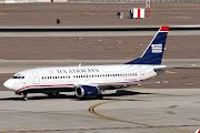 US Airways 7373G7 (23778/1455) is captured taxiing towards a Rwy 8 . (apfn awtaxiphx)