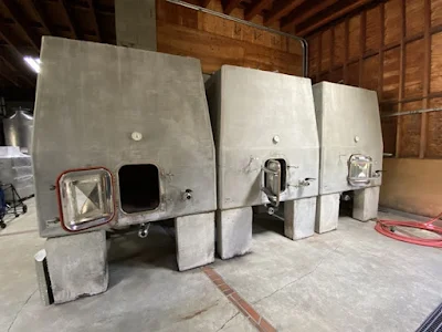 concrete fermenting tanks at Quixote Winery in Napa, California