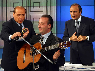Silvio Berlusconi, Mariano Apicella, Bruno Vespa, on a TV show