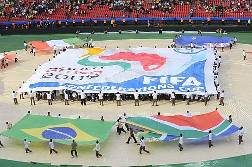 Opening ceremony World Cup 2010. Performers dance around a representation of