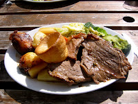 ''The quintessential English Sunday lunch. w:Roast beef, roast potatoes, vegetables and w:yorkshire pudding. Actually, the beef was kind of tough.'' Photo from flickr: http://flickr.com/ph