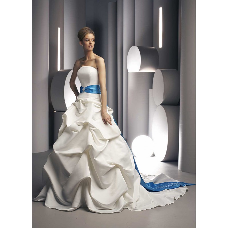 A poofy gown Love the simplicity in this dress and the white material looks