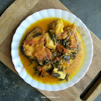 Assamese style fish curry with pirali paleng, taro root and tomatoes
