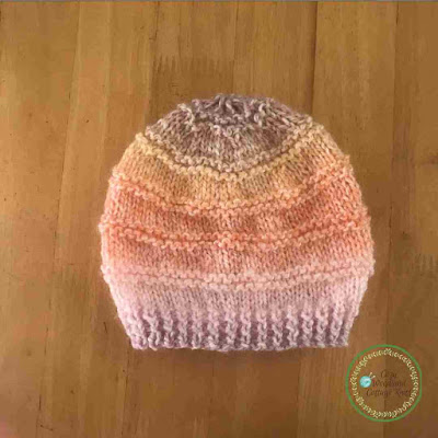 Picture of hand knitted baby beanie