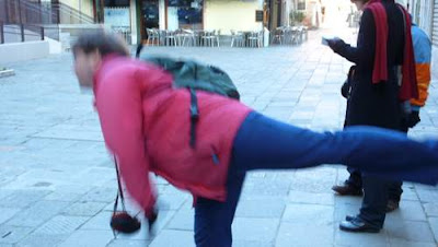 Eighth image of a phenomenally handsome and elegant scribe dancing in Venice.