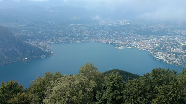 The city of Lugano, on Lake Lugano 