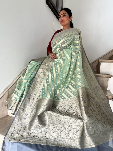 Sea green kora silk saree with silver mushroo silk border and pallu