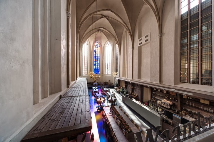 Interior of modern bookstore in old cathedral, the Netherlands