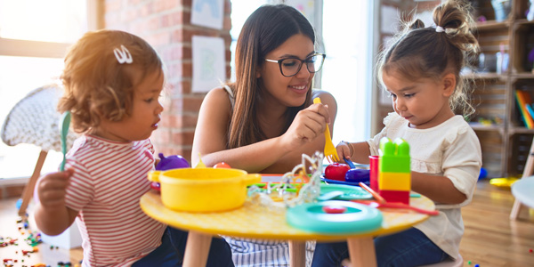 Educator working with young children