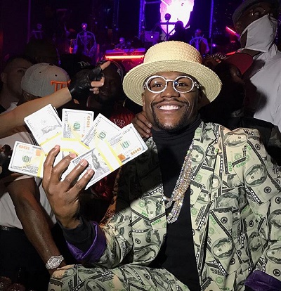 Floyd Mayweather replies those calling him Illiterate with $100m Cheque 