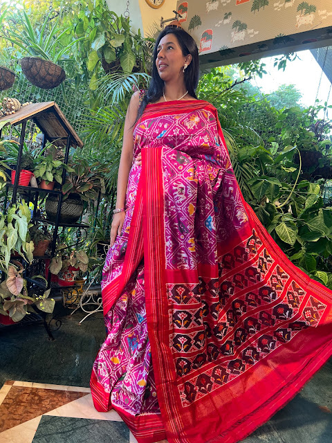 Bright pink pochampally saree with animal motis