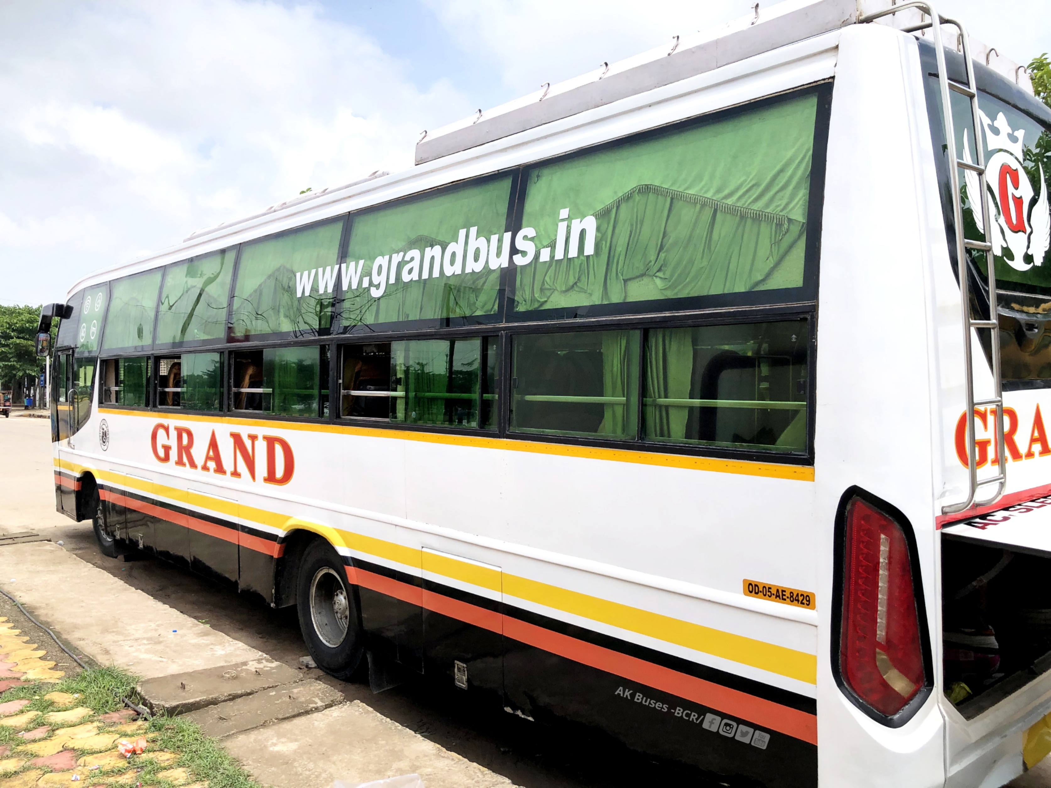 Grand Travels AC sleeper Bus side view