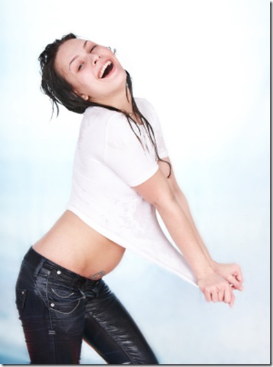 Girl in wet jeans and white t-shirt.