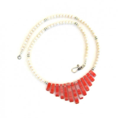 orange and white shell fan necklace.