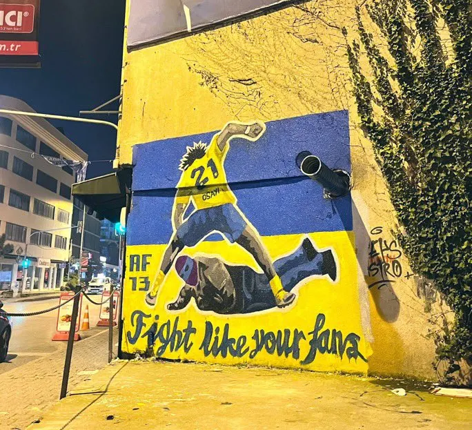 Fenerbahçe fans create a mural depicting Bright Osayi-Samuel's response to the attacking Trabzonspor fans
