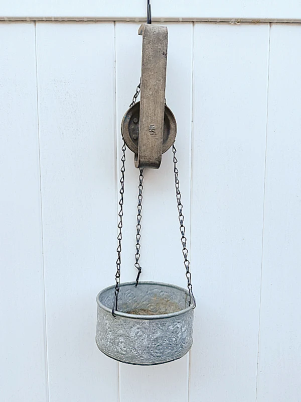 pulley on fence with planter