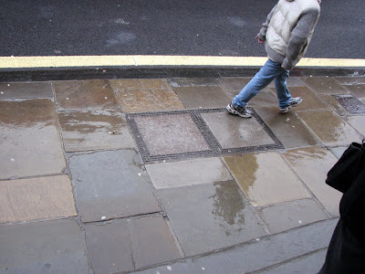 Walking on The High Street, Oxford, England, in the Rain