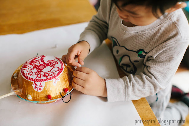 Ring in the New Year with this DIY Chinese Pellet Drum Kids Craft / Kids friendly craft to celebrate the Lunar New Year 2016, the Year of the Monkey.