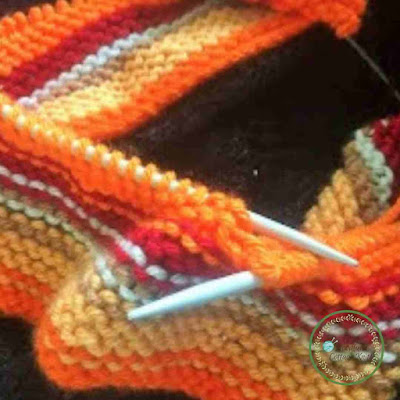 Picture of knitting a bright chunky throw for our home