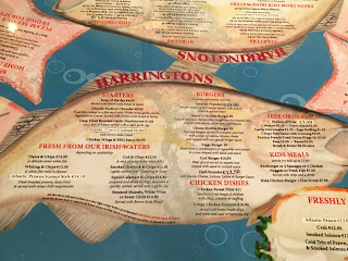 Fun menu's on the tables of Harrington's family restaurant in Dingle Ireland