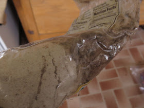 packages of flour with grain moth damage