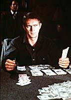 In the film, the Kid plays the last hand much more solidly than he does in the novel