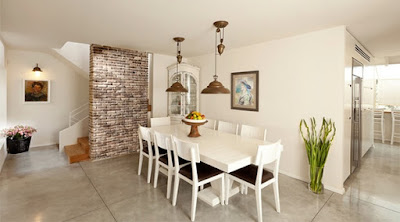 Dining Room With Brick Walls