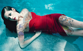 Milla Jovovich Old style Tattoo