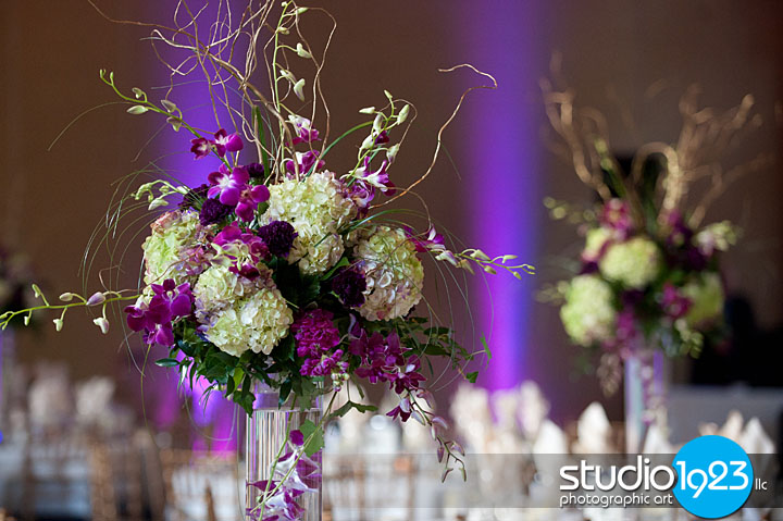 Our beautiful pedestal centerpieces contained curly willow eggplant 