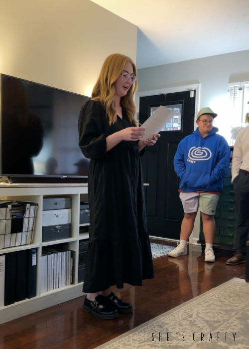 Young Adult woman reading her mission call.