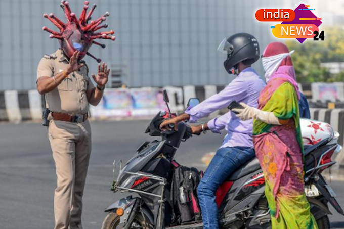 Indian police officer warns people wearing coronavirus helmet