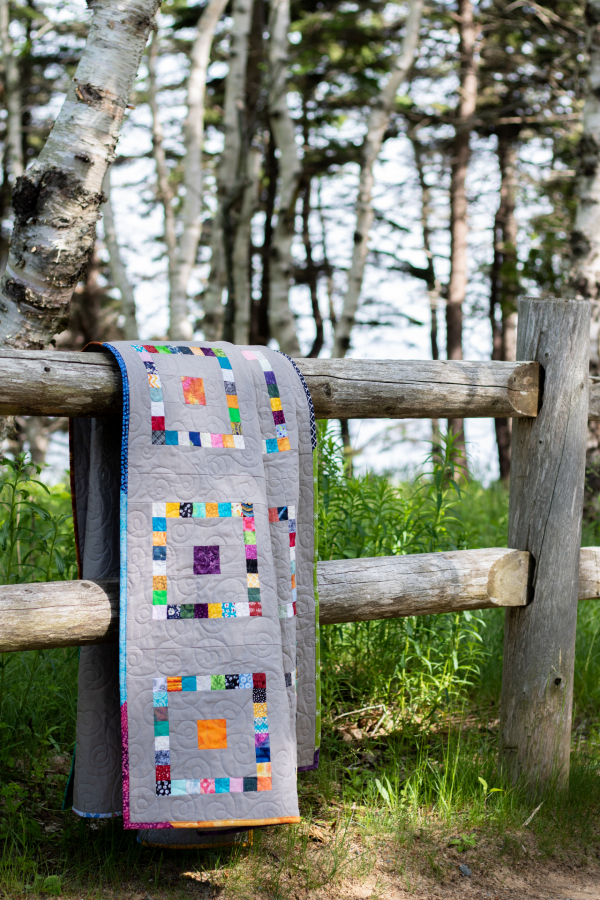 Scrappy Playground quilt | DevotedQuilter.com