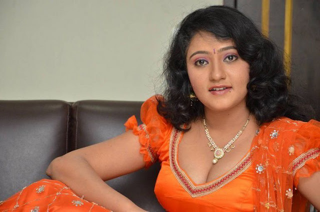 Akshara's Orange Elegance: Puff Sleeved Bliss in Telugu Glam