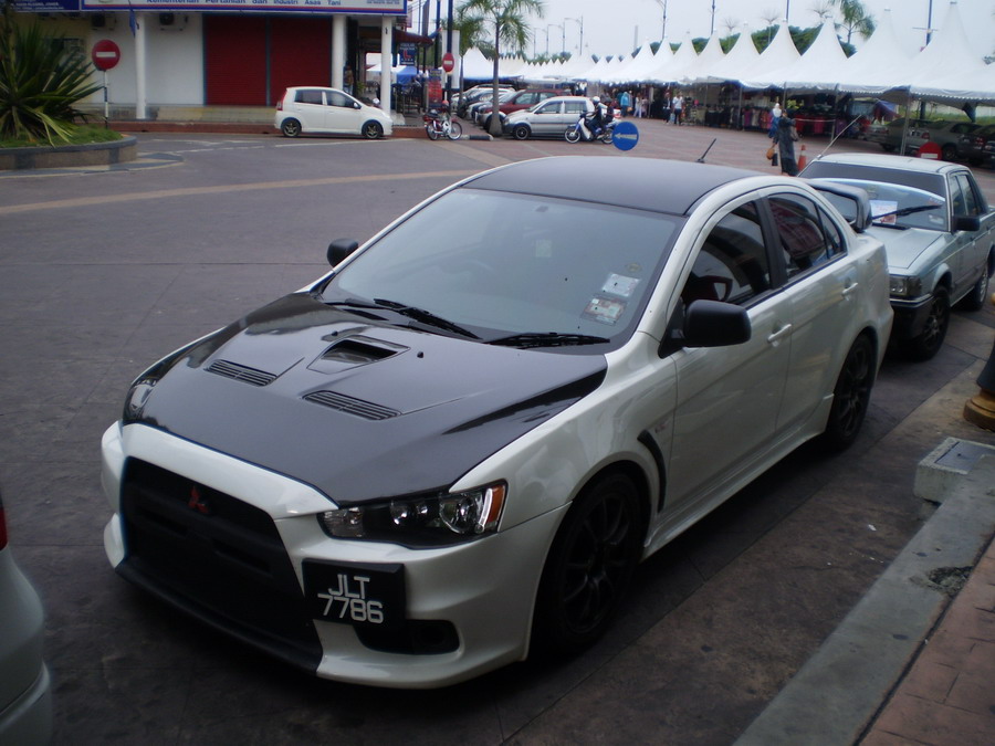Mitsubishi Lancer converted to Evo X body kit without wide body 