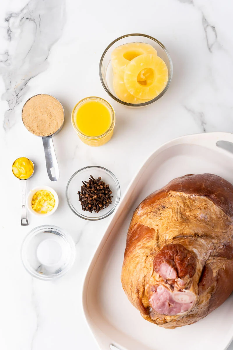 Ingredients needed to make Christmas ham all portioned out.