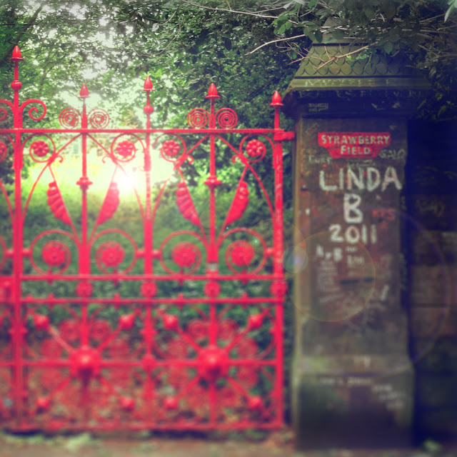 Gates and grafitti at Strawberry Field, Liverpool - Photograph by Tim Irving