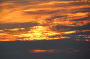 . Lake Superior sunset. Unfortunately, there were clouds on the horizon. (another sunset )