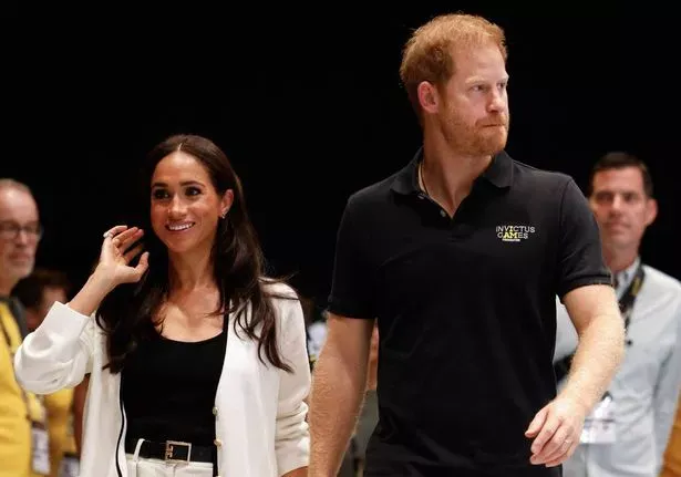 Prince Harry Receives 'Inappropriate' Gift as Meghan Markle Bursts Into Laughter