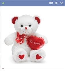 Teddy bear holding heart