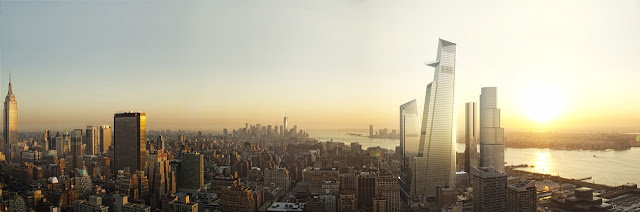 Picture of four new buildings at the sunset with Lower Manhattan in the background