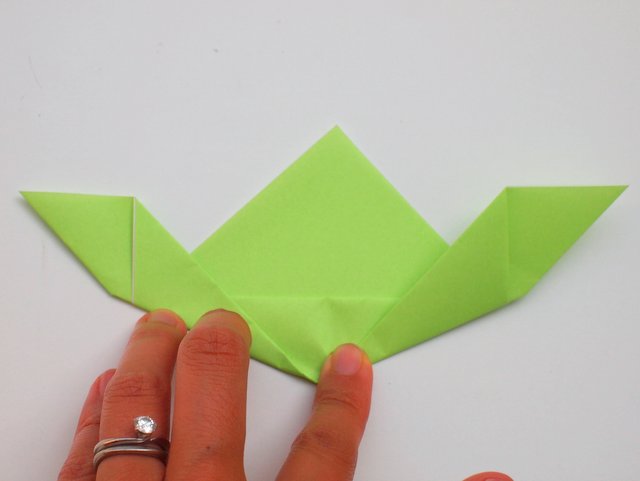 Instruction showing how to fold a super easy origami Yoda Tutorial- Great kids craft for all ages