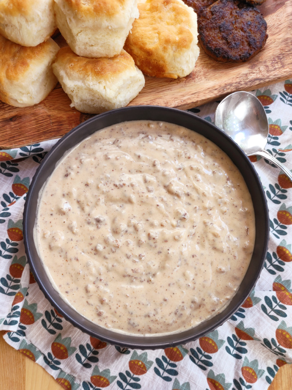 Southern Sausage Gravy! A classic recipe for traditional sausage gravy made with breakfast sausage and milk served the Southern way, over hot biscuits.