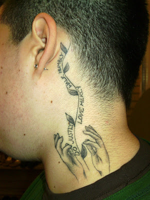 Tattoos For Women On Back Of Neck. Quite an elaborate neck tattoo