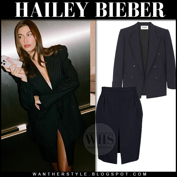 Hailey Bieber in black pinstripe blazer and skirt