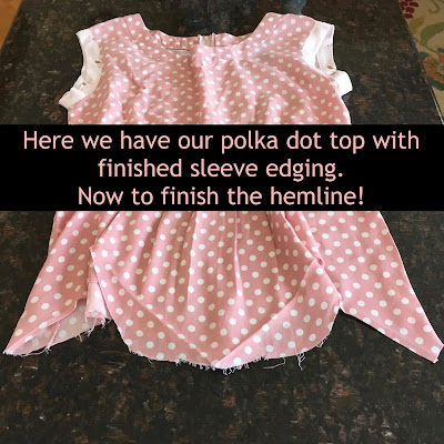 Here we have our polka dot top finished with sleeve edging and now to finish the uneven hemline.