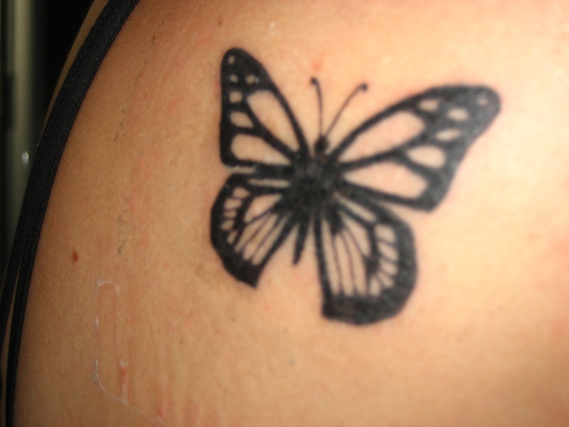 butterfly wrist tattoos. girly wrist tattoos.