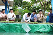 Tabur Bibit Ikan Lele Di 25 Kolam,Wabup Siak Husni Merza:Supaya Dapat Meningkatkan Produksi Ikan Lele Di Kampung Sawit Permai 