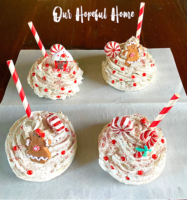 four faux whipped cream Christmas mug toppers