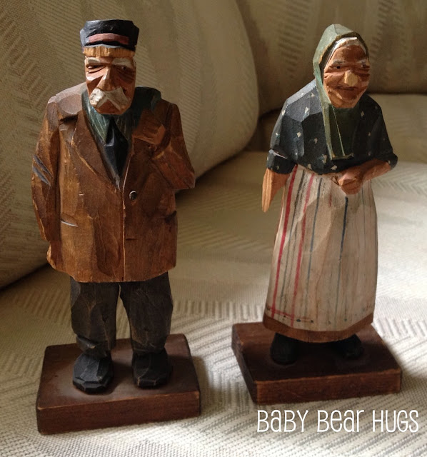 old man and old women wooden figurines 