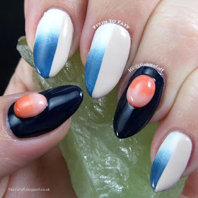 Neutral blue and white gradient colorblocking nail art inspired by fashion.